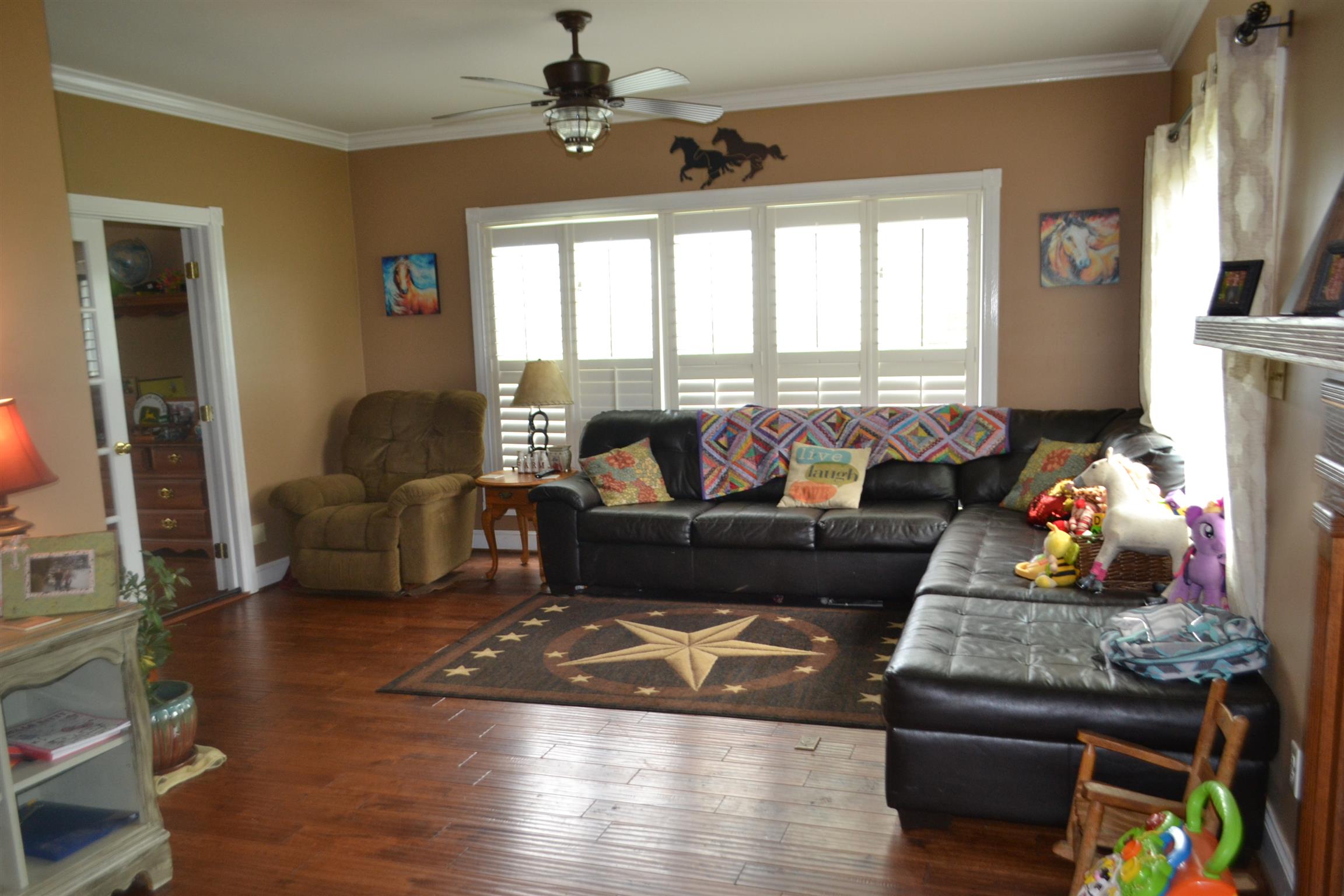 2436 Morrison Viola Road Morrison, TN 37357 - Photo 11 of 28 a living room with furniture and a floor to ceiling window