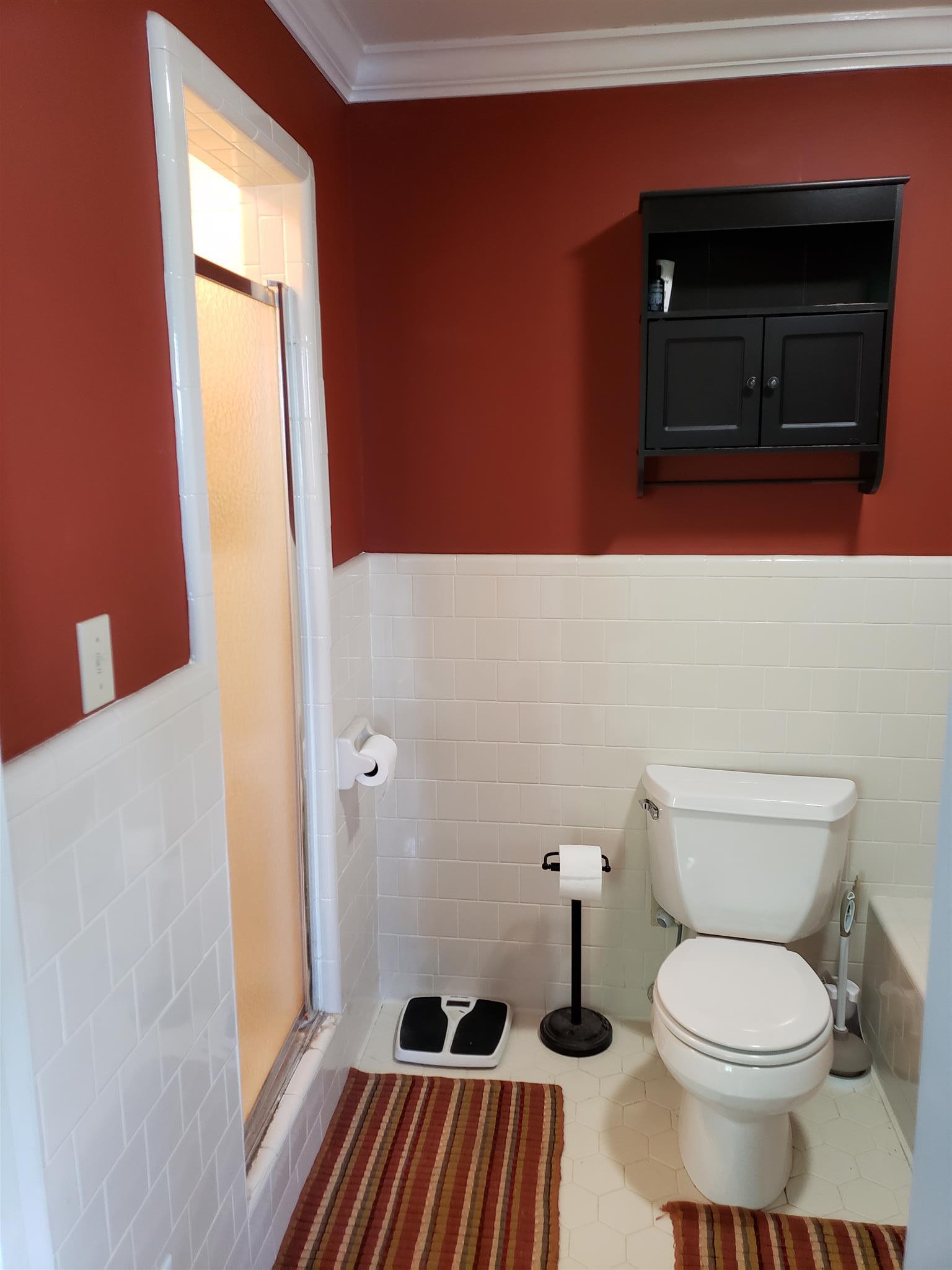 2436 Morrison Viola Road Morrison, TN 37357 - Photo 22 of 28 a bathroom with a toilet a sink and a mirror