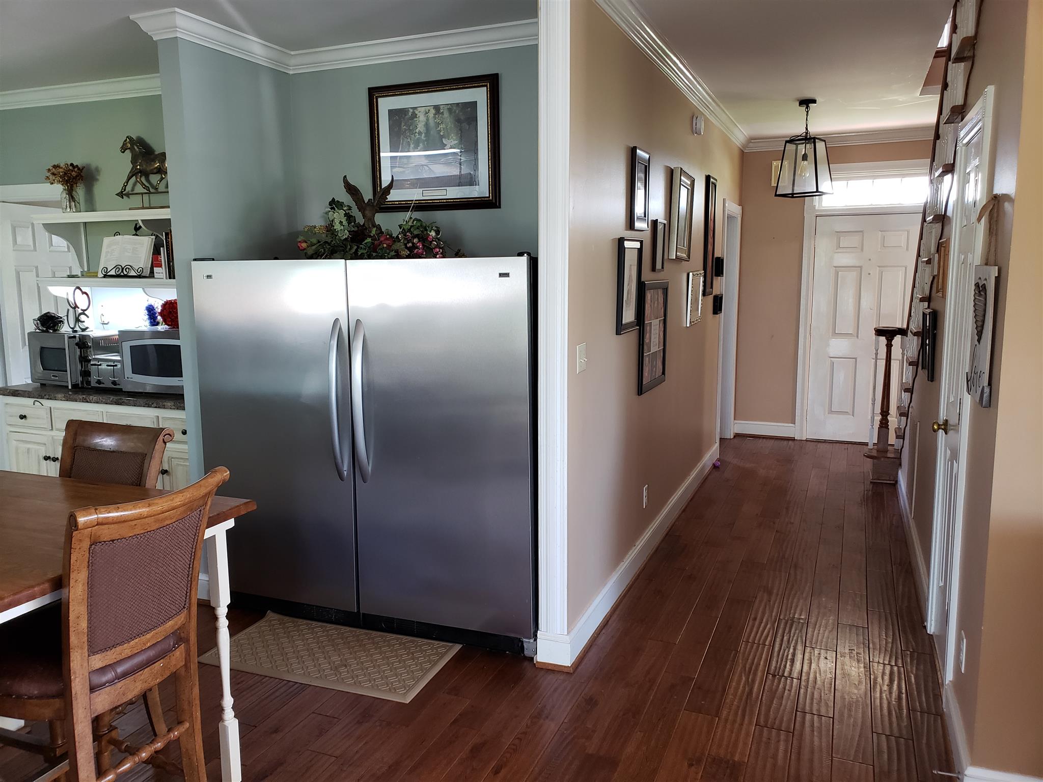 2436 Morrison Viola Road Morrison, TN 37357 - Photo 3 of 28 a kitchen with stainless steel appliances a refrigerator and a stove top oven