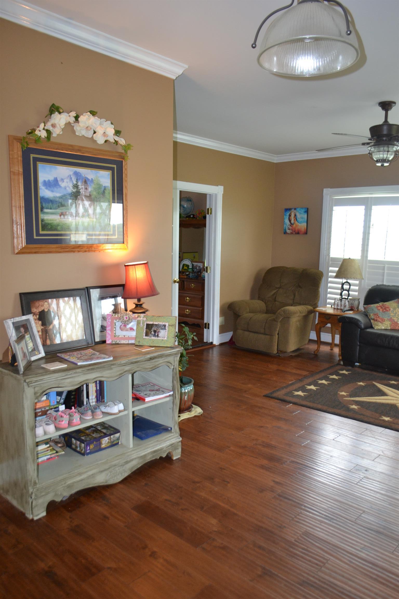 2436 Morrison Viola Road Morrison, TN 37357 - Photo 10 of 28 a living room with furniture and a wooden floor