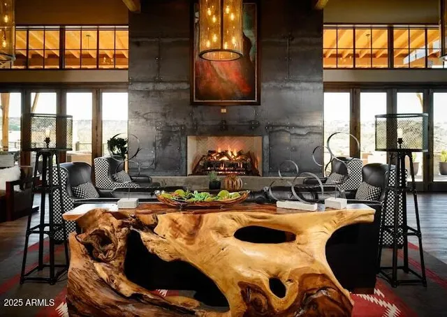 a dining room with furniture window and a floor to ceiling window