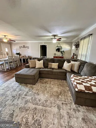 a living room with furniture and a couch