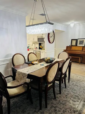 a view of a table and chairs in a patio