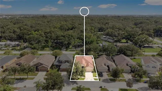 a front view of a house with a yard and porch
