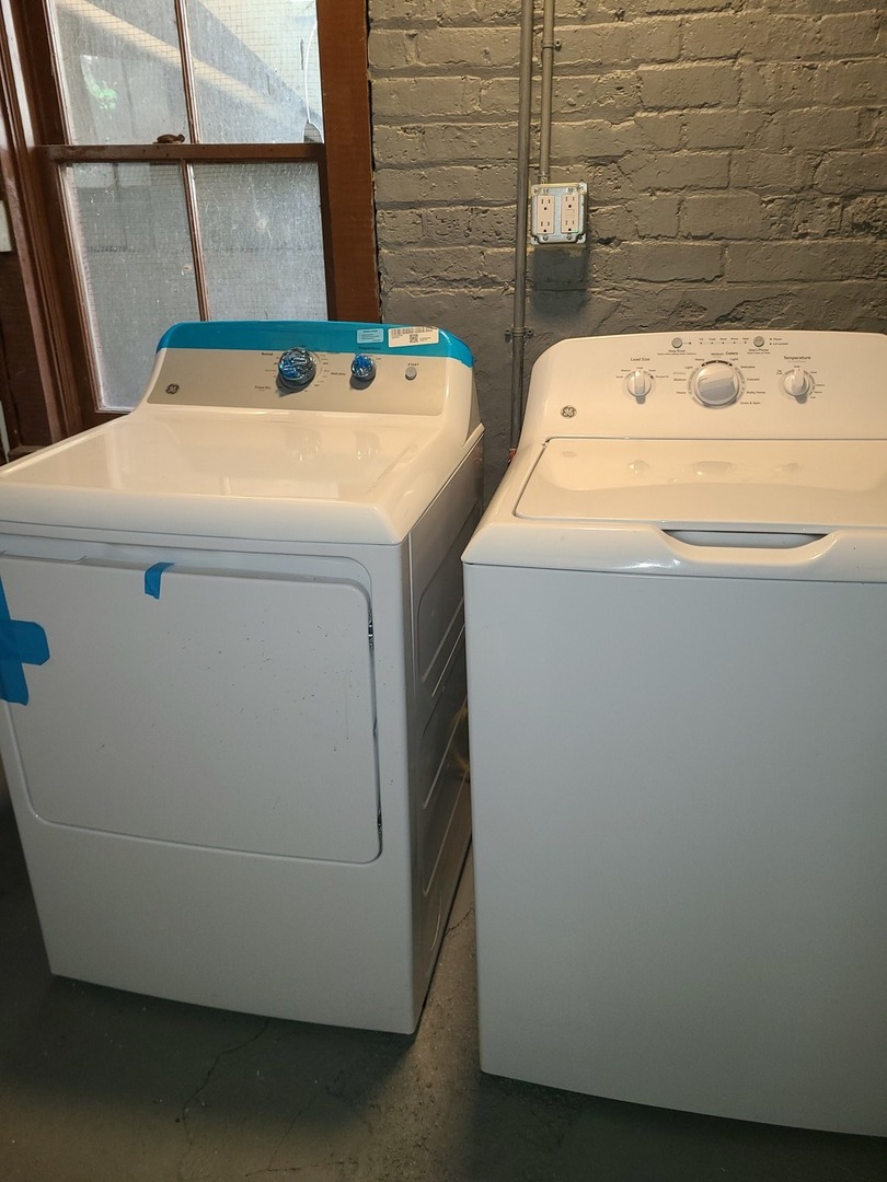 1531 West Highland Avenue, Unit 1 Chicago, IL 60660 - Photo 14 of 14 a utility room with dryer and washer