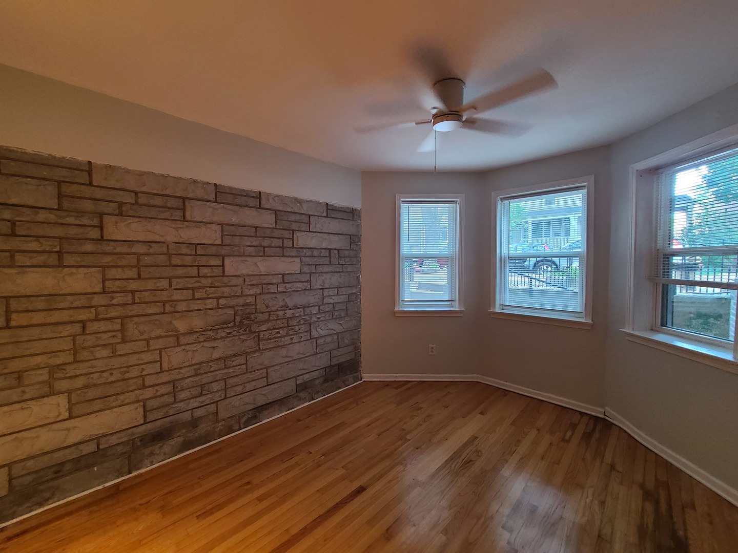 1531 West Highland Avenue, Unit 1 Chicago, IL 60660 - Photo 9 of 14 a view of empty room with windows