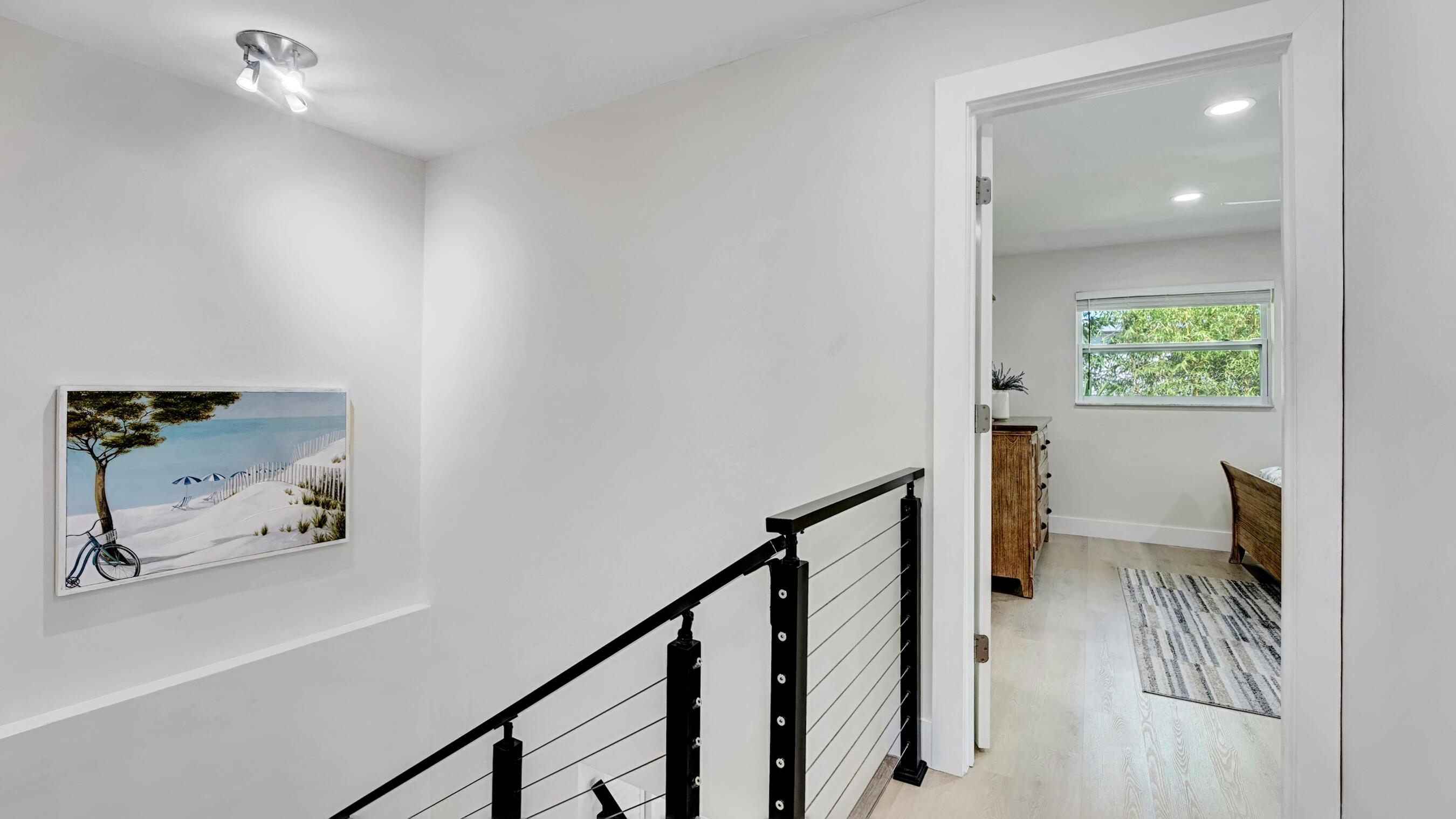 218 Northeast 10th Street Delray Beach, FL 33444 - Photo 14 of 43 a view of a hallway with workspace