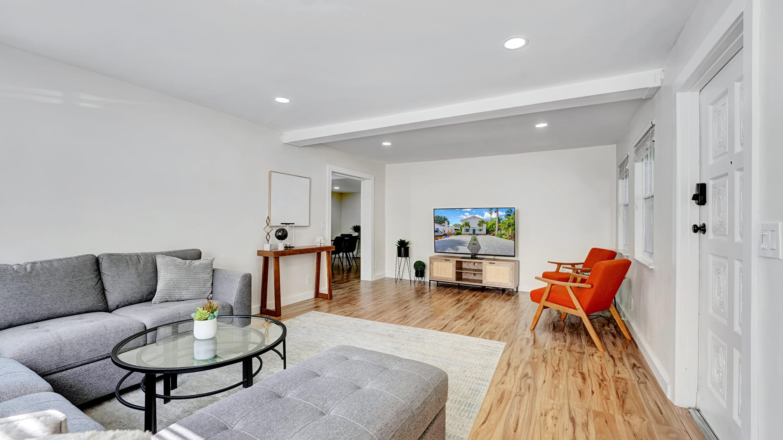 218 Northeast 10th Street Delray Beach, FL 33444 - Photo 31 of 43 a living room with furniture and a wooden floor