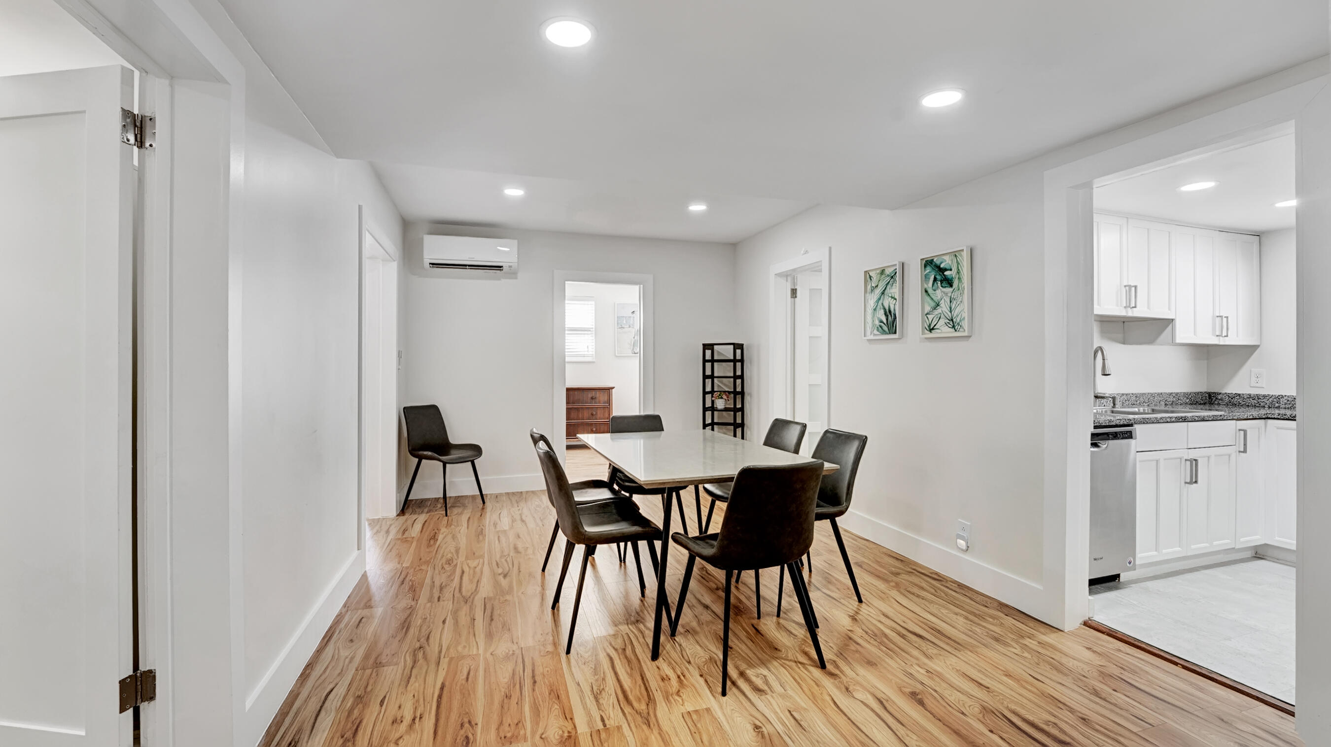 218 Northeast 10th Street Delray Beach, FL 33444 - Photo 32 of 43 a view of a dining room with furniture and wooden floor