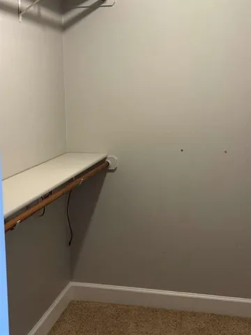 a bathroom with a double vanity sink and mirror