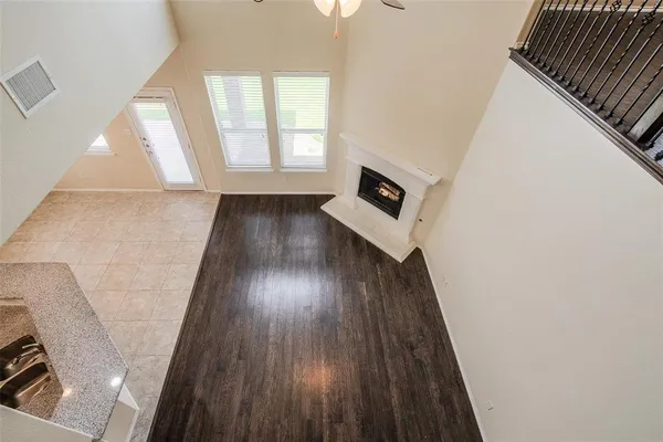 an entryway with wooden floor