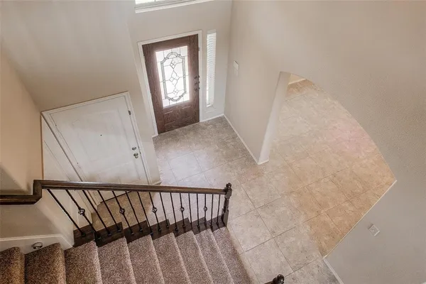 a view of a hallway with windows