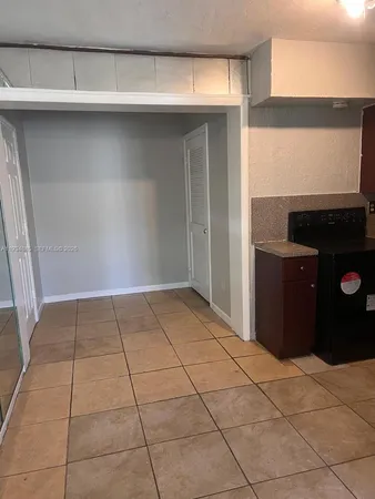 a kitchen with a cabinets