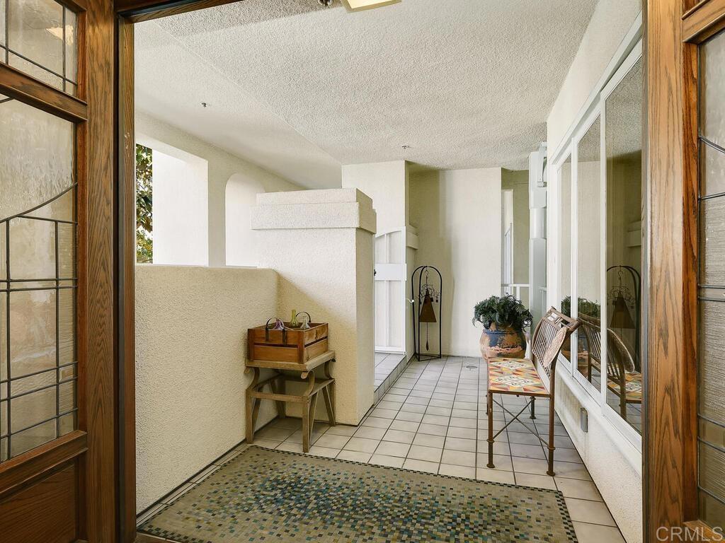 1099 1st Street, Unit 217 Coronado, CA 92118 - Photo 6 of 32 a living room with furniture