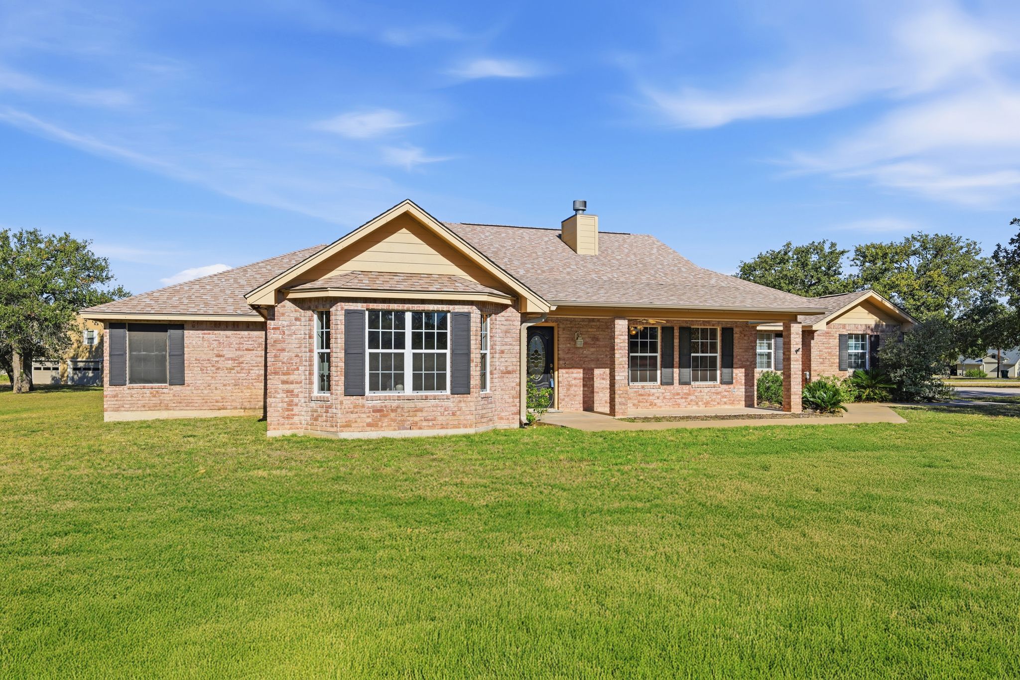 200 Apache Trail Burnet, TX 78611 - Photo 2 of 40 Front of home on large.89 acre lot.