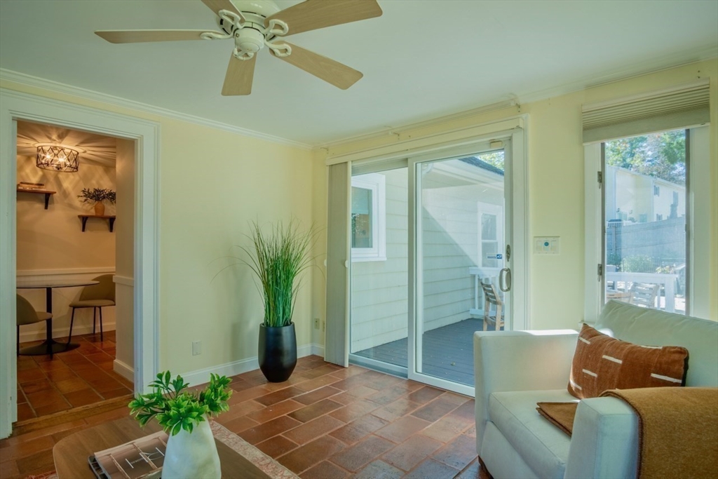 3 Elliot Road Lynnfield, MA 01940 - Photo 14 of 42 a living room with furniture and a chandelier