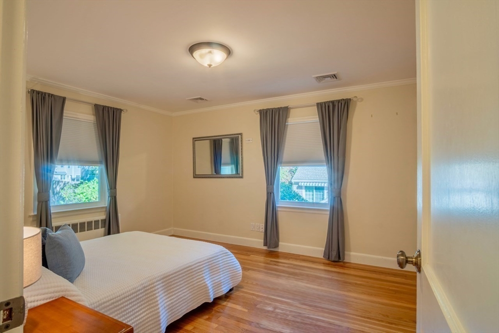 3 Elliot Road Lynnfield, MA 01940 - Photo 19 of 42 a bedroom with a bed and a window