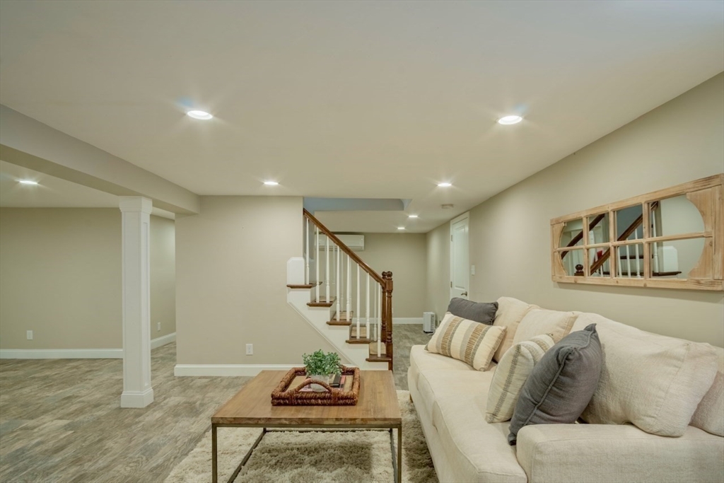 3 Elliot Road Lynnfield, MA 01940 - Photo 26 of 42 a living room with furniture and wooden floor