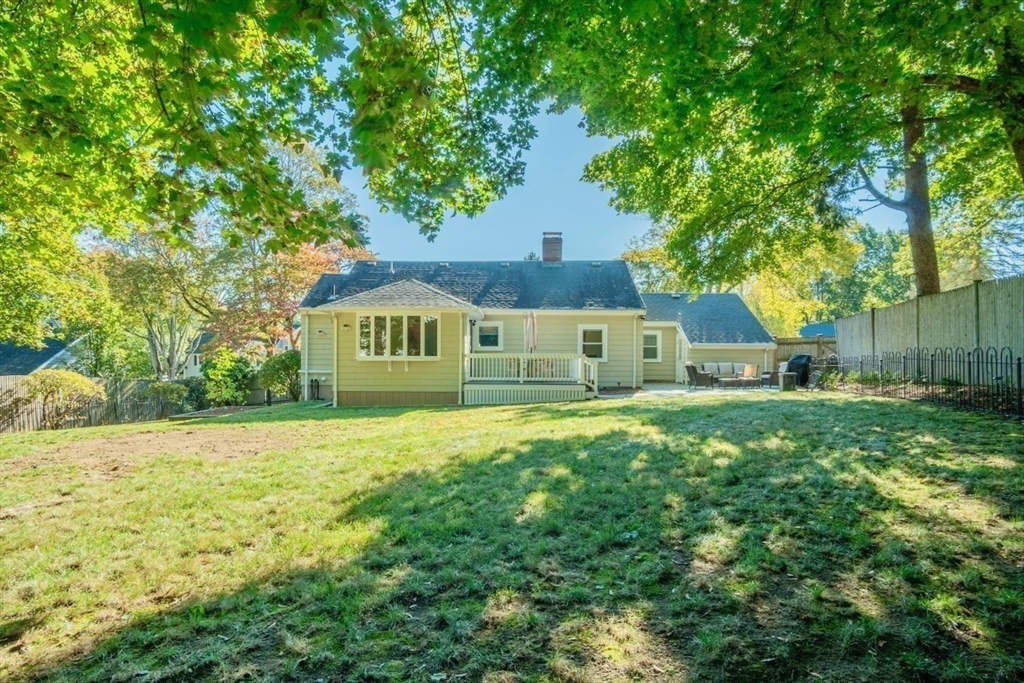 3 Elliot Road Lynnfield, MA 01940 - Photo 3 of 42 a front view of a house with garden