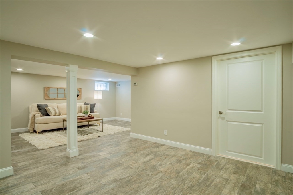 3 Elliot Road Lynnfield, MA 01940 - Photo 31 of 42 a view of a livingroom with furniture and windows