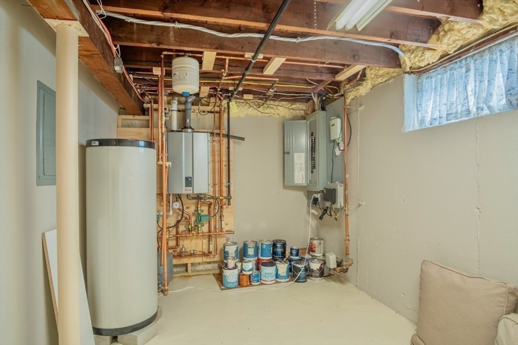 3 Elliot Road Lynnfield, MA 01940 - Photo 37 of 42 a view of storage and utility room with a chair