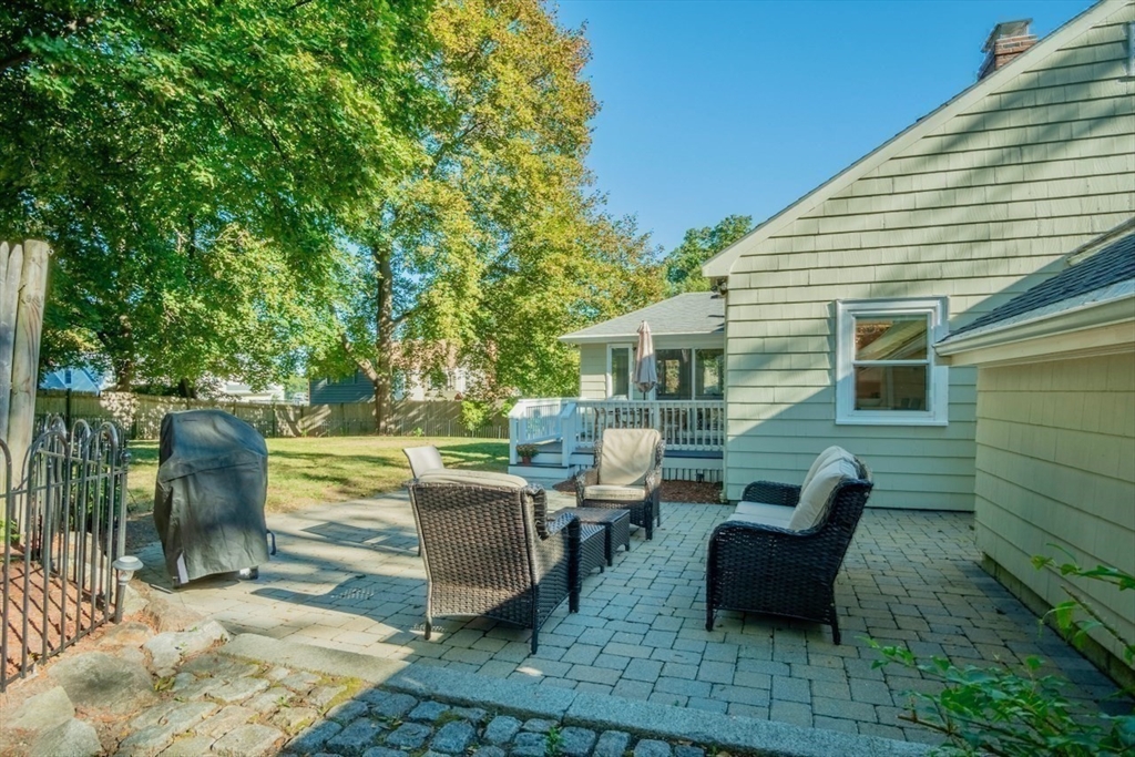 3 Elliot Road Lynnfield, MA 01940 - Photo 39 of 42 a view of a patio with couches chairs and a table and chairs with garden view