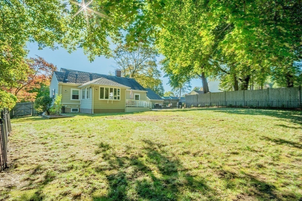 3 Elliot Road Lynnfield, MA 01940 - Photo 40 of 42 a view of swimming pool with tree in the background