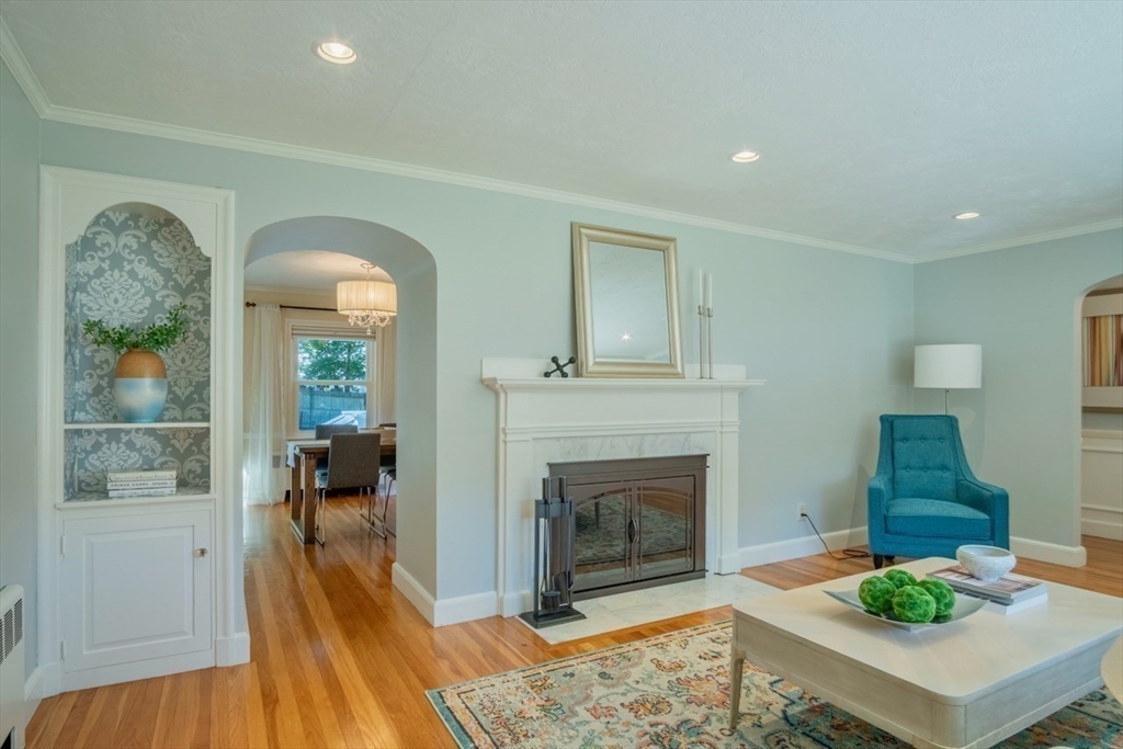 3 Elliot Road Lynnfield, MA 01940 - Photo 7 of 42 a living room with furniture and a fireplace