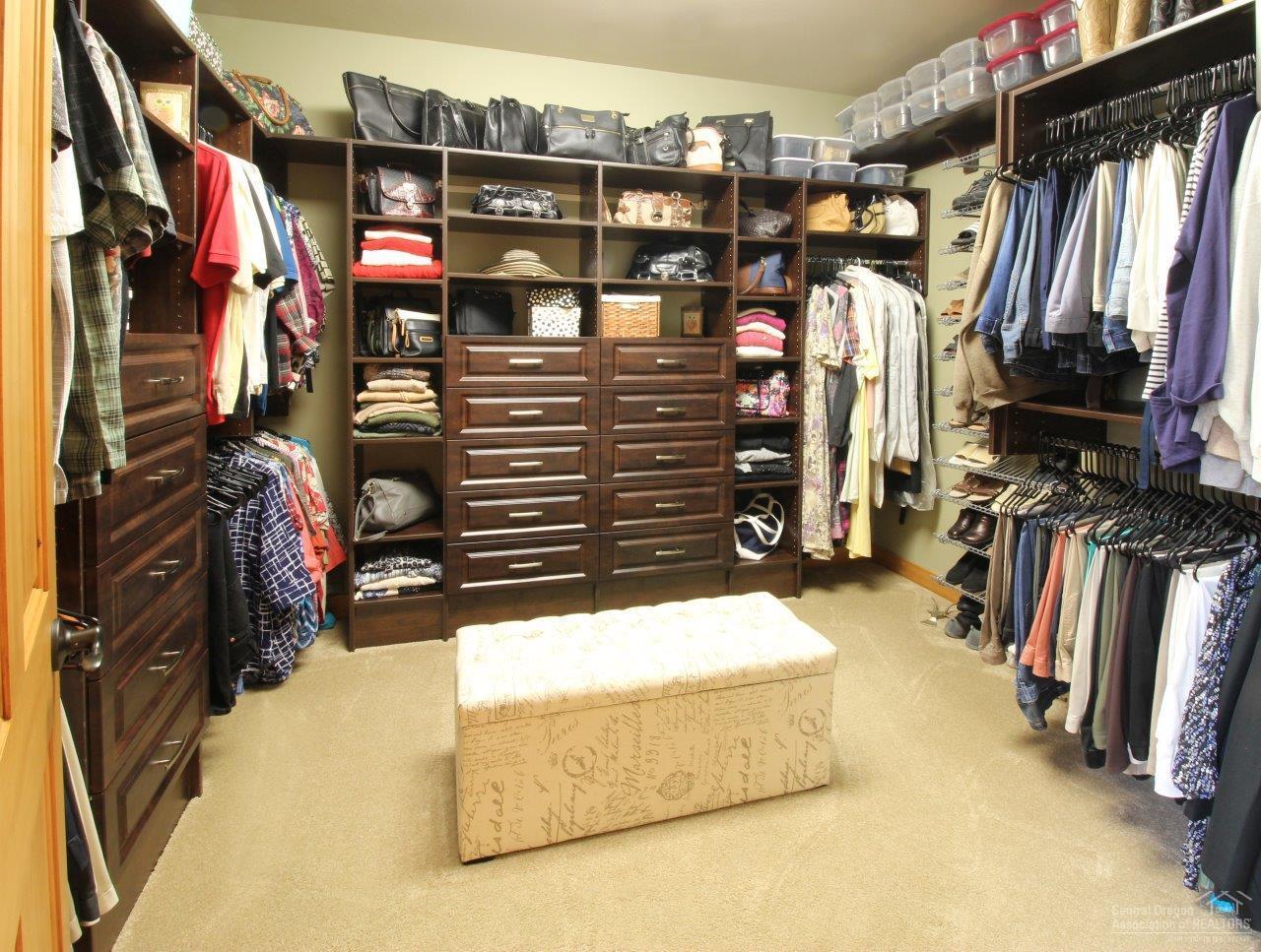 64534 Sylvan Loop Bend, OR 97701 - Photo 15 of 23 a view of walk in closet with clothes