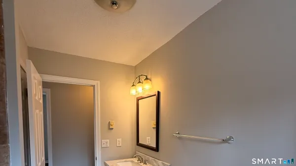 a view of a hallway with windows