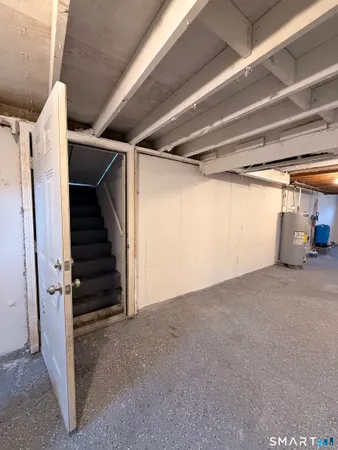 a view of empty room with stairs