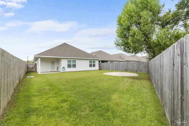 a view of a house with a swimming pool