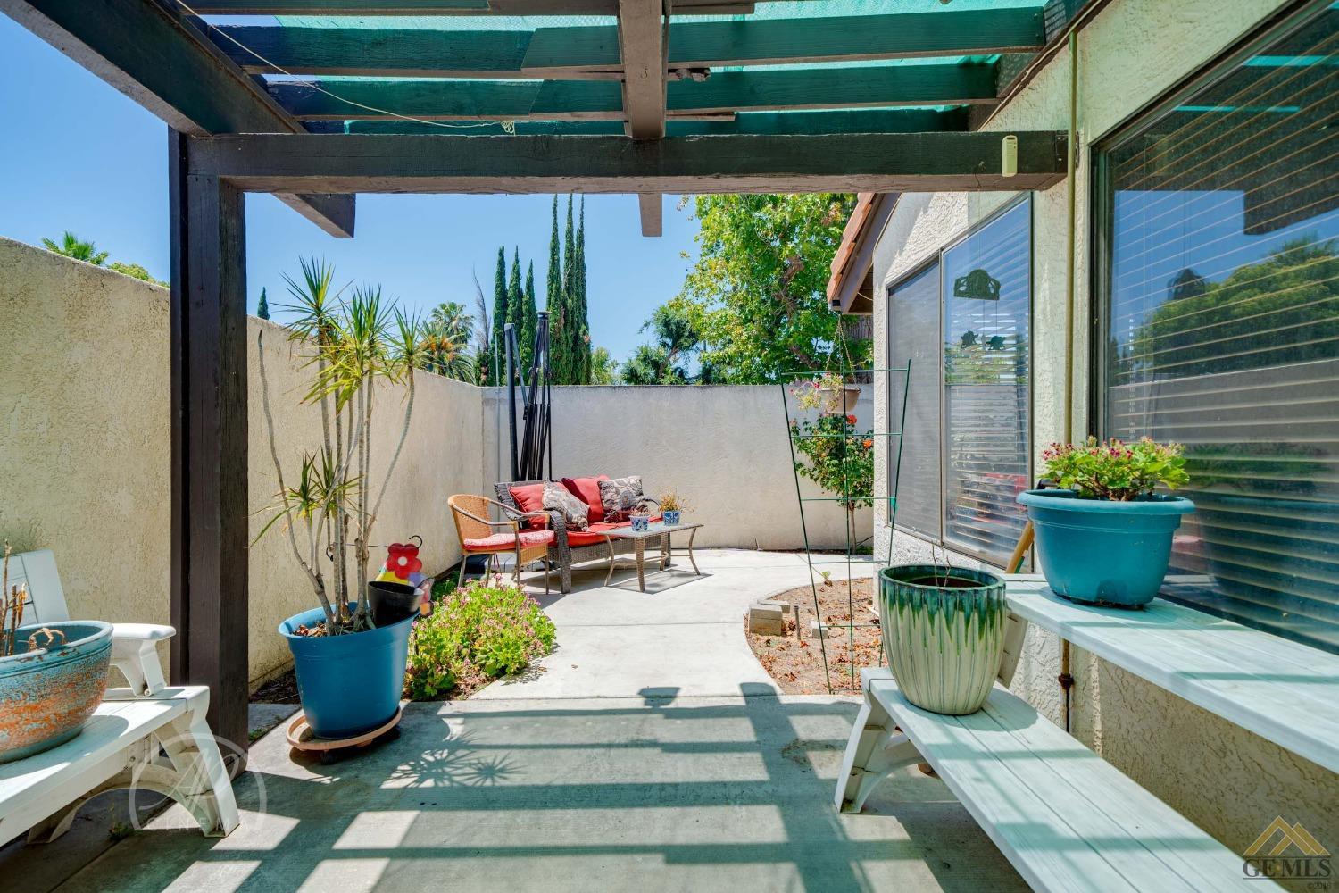 Undisclosed Address Bakersfield, CA 93309 - Photo 23 of 26 a view of a porch with furniture and a potted plant