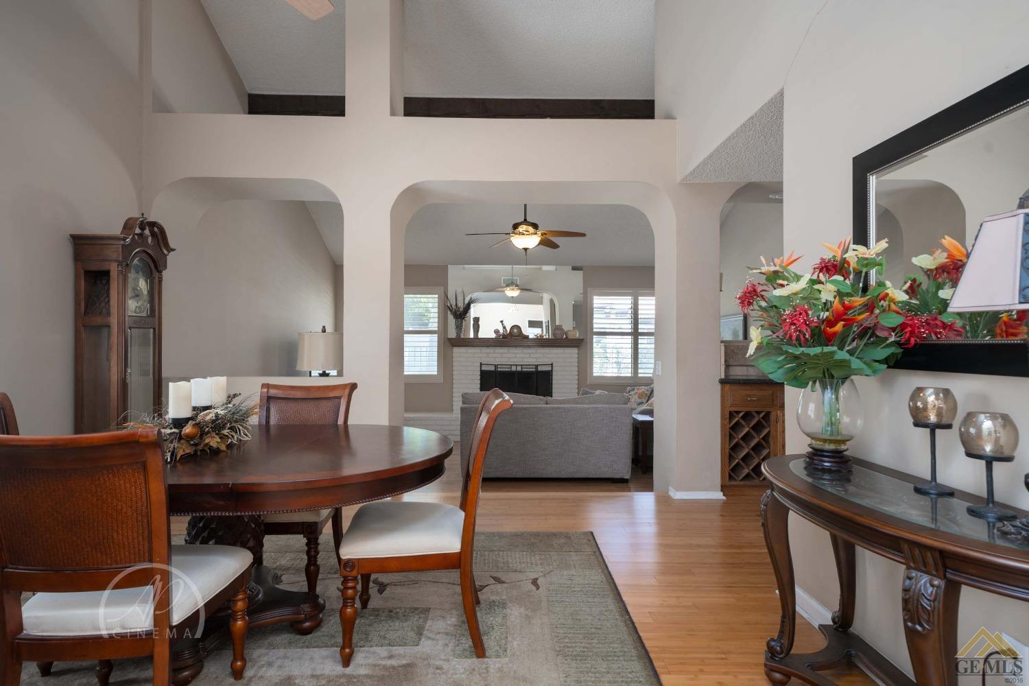 Undisclosed Address Bakersfield, CA 93309 - Photo 4 of 26 a dining room with furniture and wooden floor