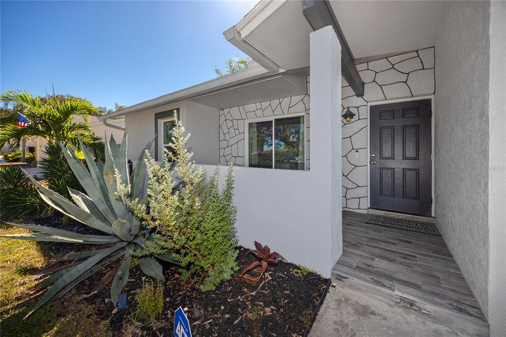 1869 Seton Drive Clearwater, FL 33763 - Photo 2 of 40 a view of a house with a yard