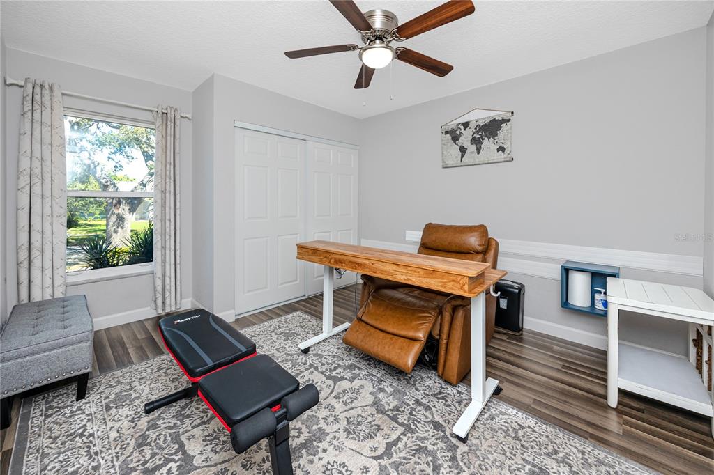 1869 Seton Drive Clearwater, FL 33763 - Photo 23 of 40 a living room with furniture and a window