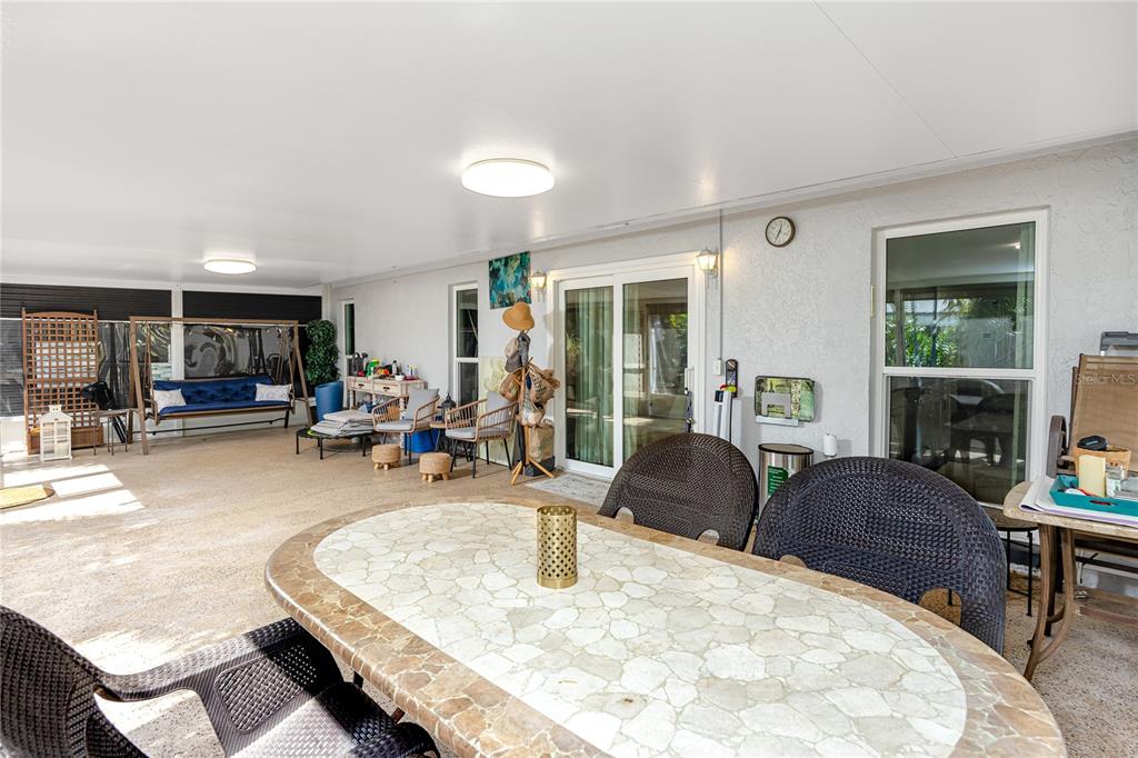 1869 Seton Drive Clearwater, FL 33763 - Photo 27 of 40 a living room with furniture and a table