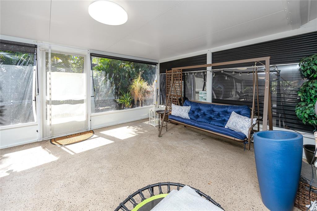 1869 Seton Drive Clearwater, FL 33763 - Photo 28 of 40 a bedroom with furniture and a large window