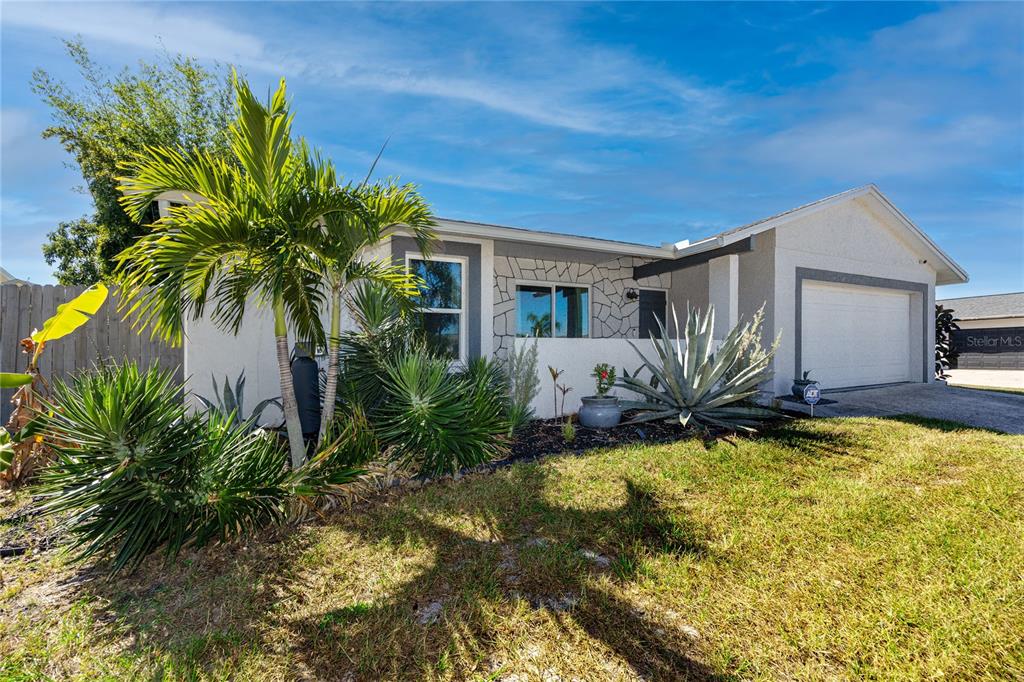 1869 Seton Drive Clearwater, FL 33763 - Photo 37 of 40 a view of a house with a big yard