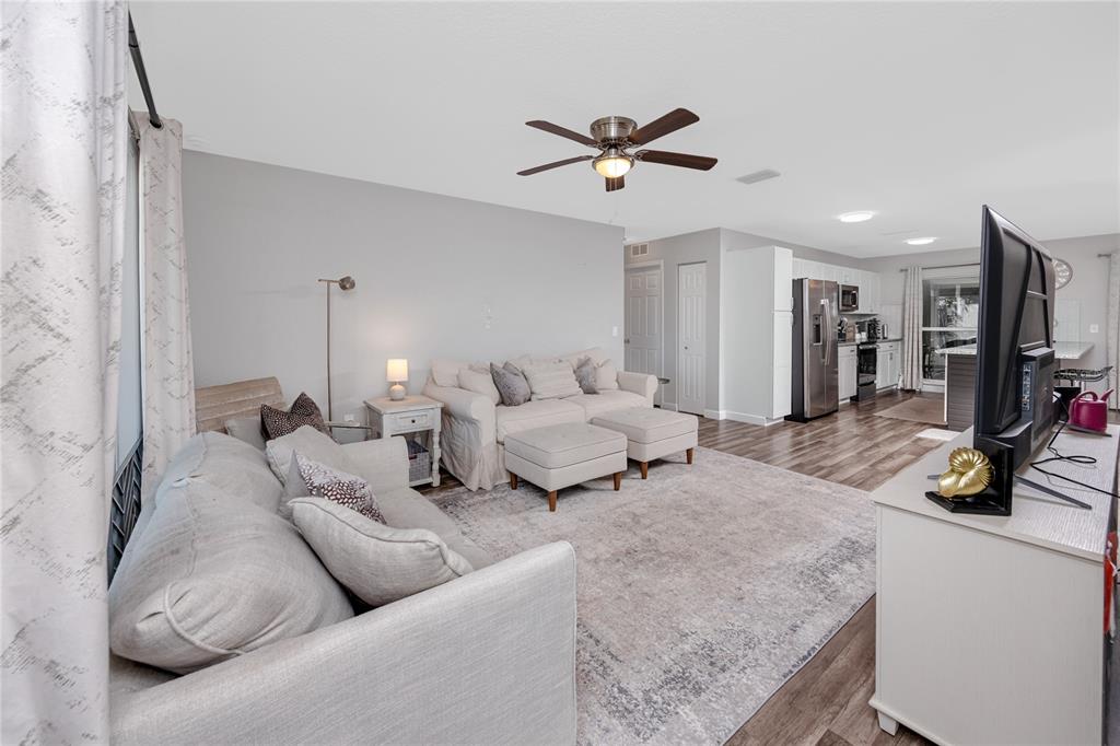 1869 Seton Drive Clearwater, FL 33763 - Photo 4 of 40 a living room with furniture and a flat screen tv