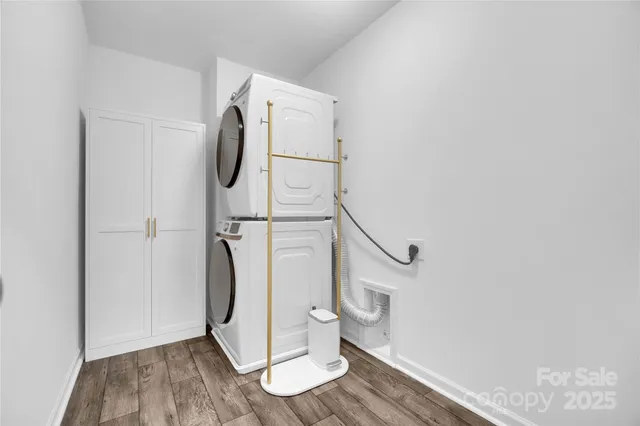 a bathroom with a granite countertop shower and a toilet