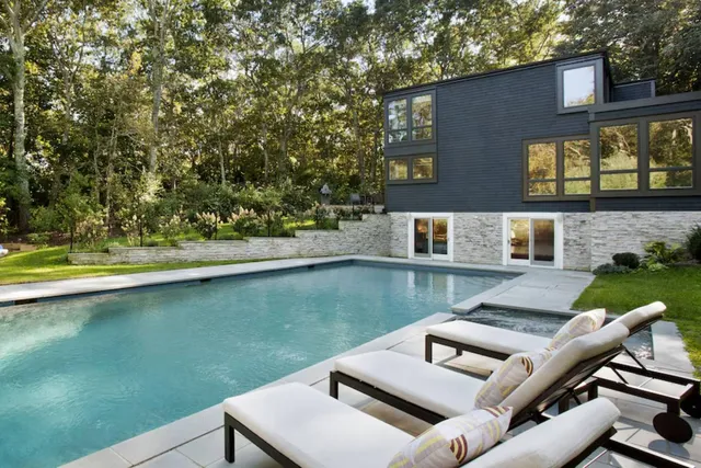 a view of a chairs and table in the patio