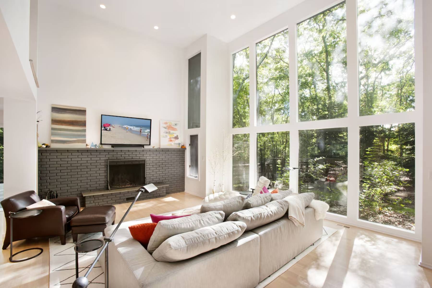 1006 Head Of Pond Road Water Mill, NY 11976 - Photo 4 of 18 a living room with furniture and a flat screen tv