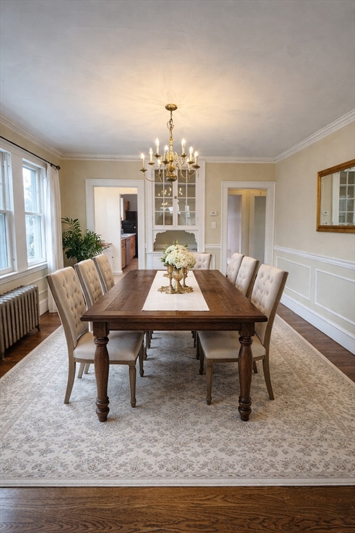 127 St Andrew Road, Unit 2 Boston, MA 02128 - Photo 3 of 15 a view of a dining room with furniture window and wooden floor