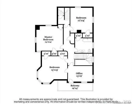 a large bed sitting in a bedroom next to a window