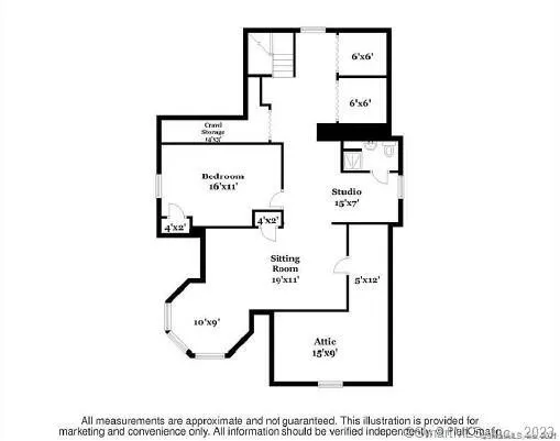 a large bedroom with a bed and a couch