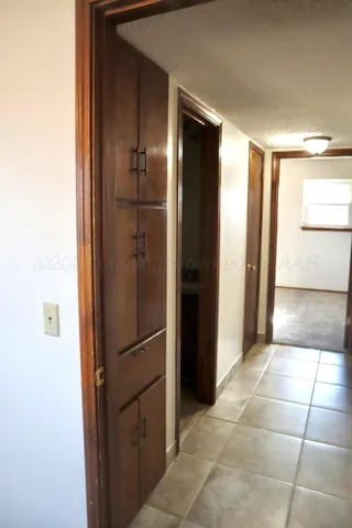 a kitchen that has a sink and a stove