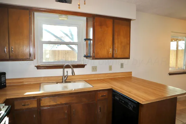 a view of a backyard of a house