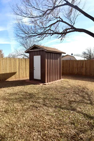 a view of a house with snow on the wall