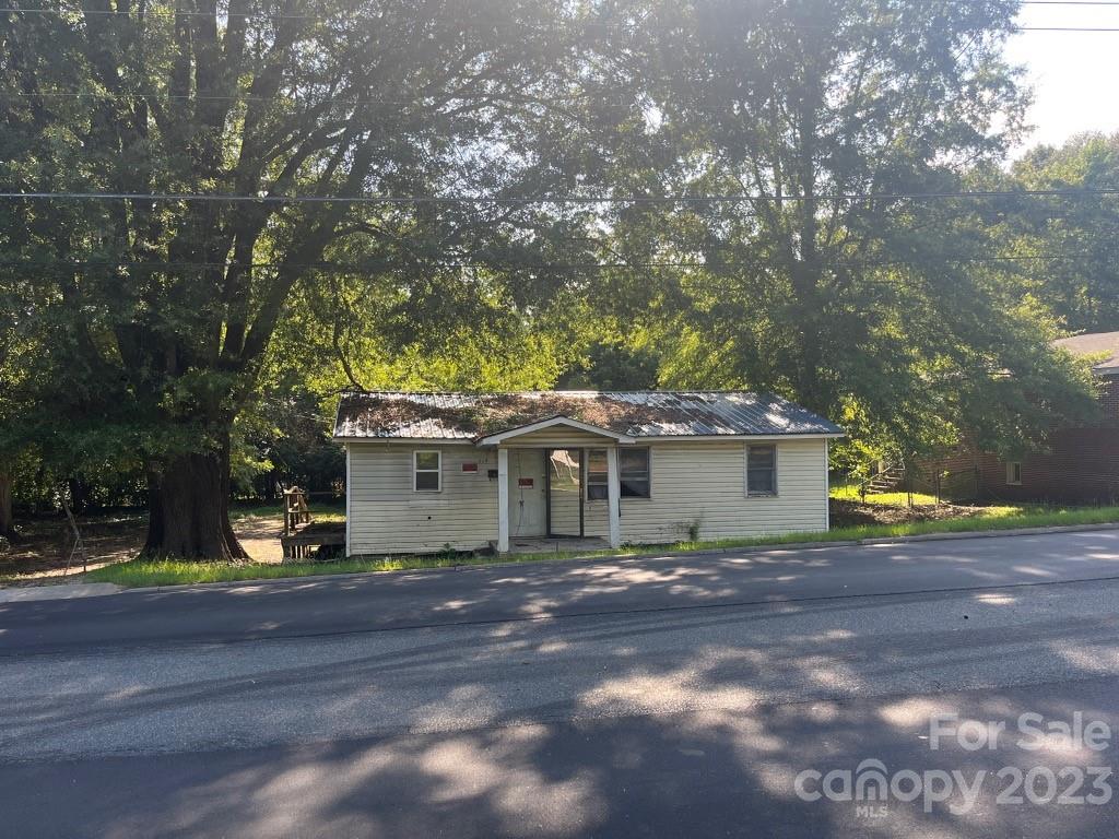 214 North Long Drive Rockingham, NC 28379 - Photo 1 of 1 a front view of a house with a yard and garage